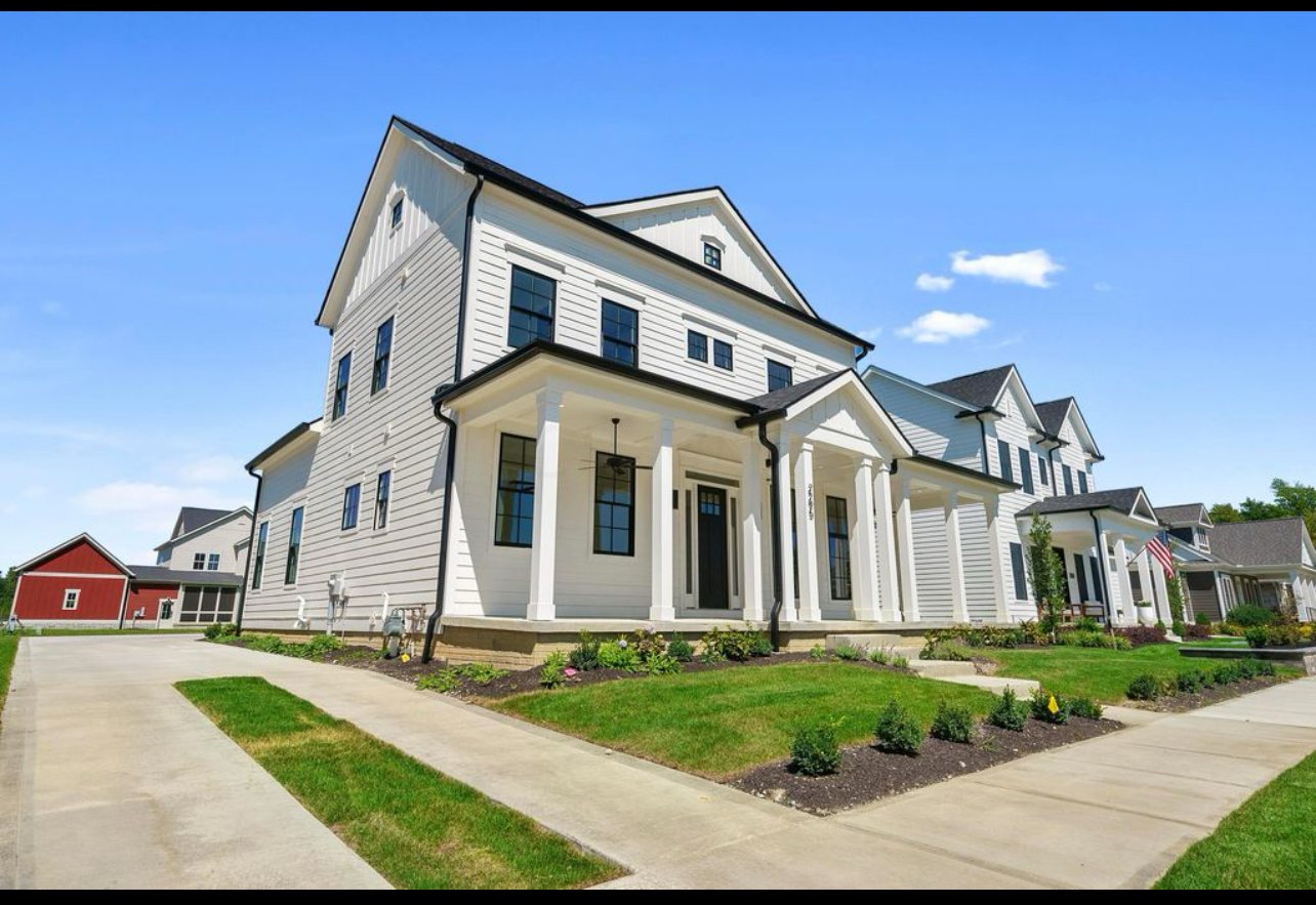 Corner elevation by Three A Homes