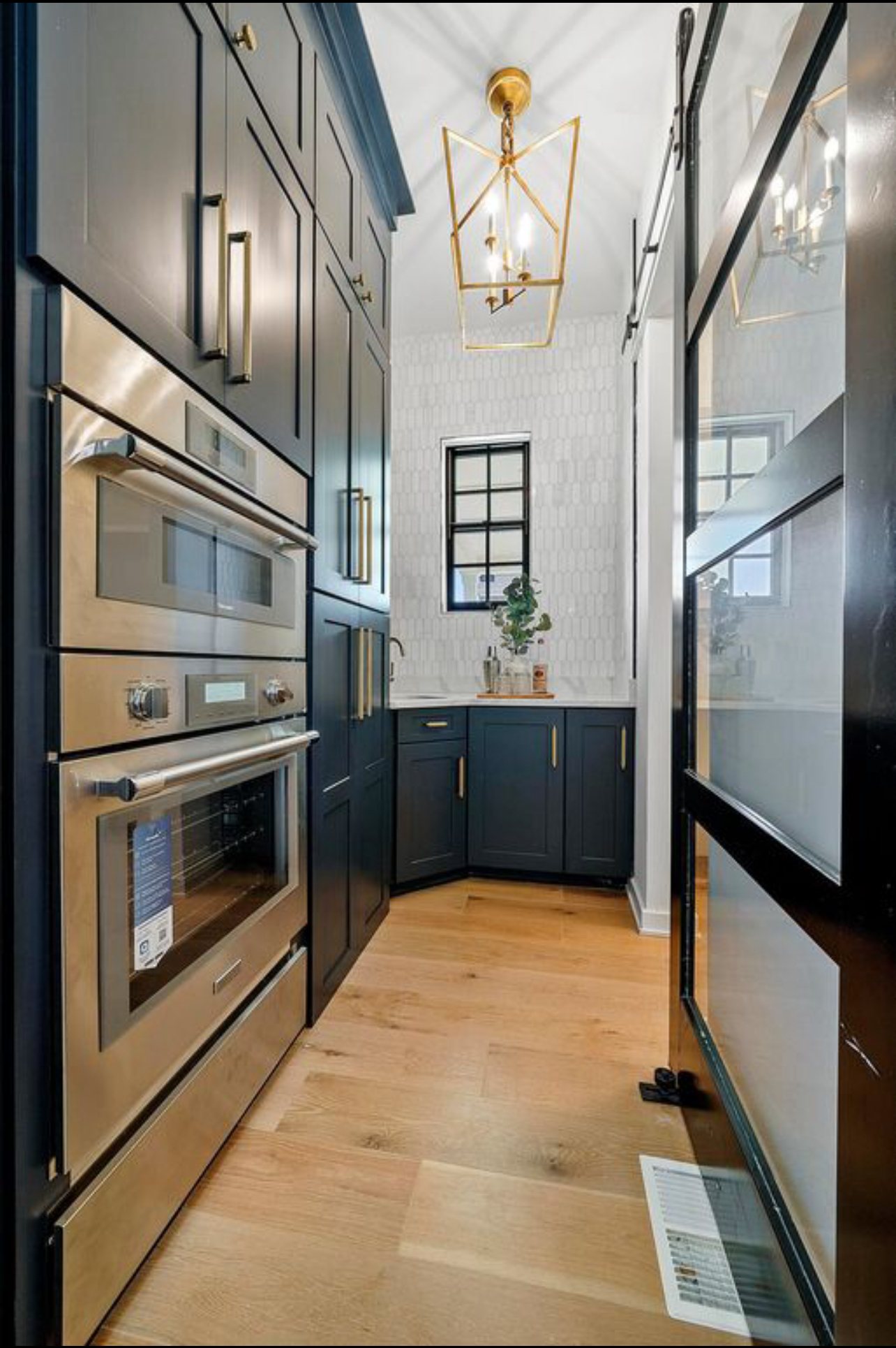 Pantry passage by Three A Homes